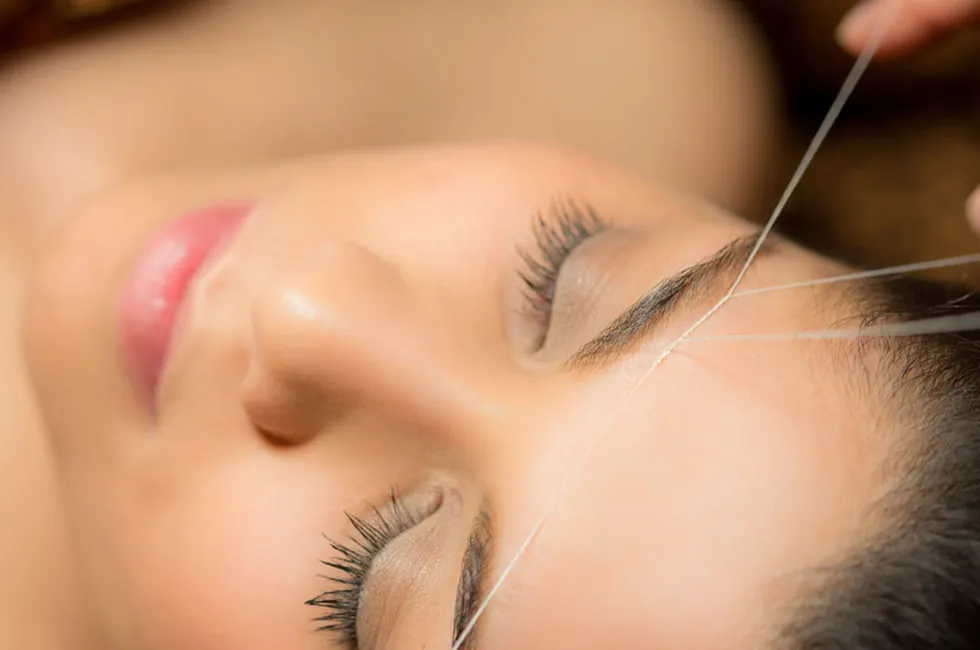 Professional beauty services at Brooklyn Brows featuring eyebrow threading, tinting, and body waxing treatments.