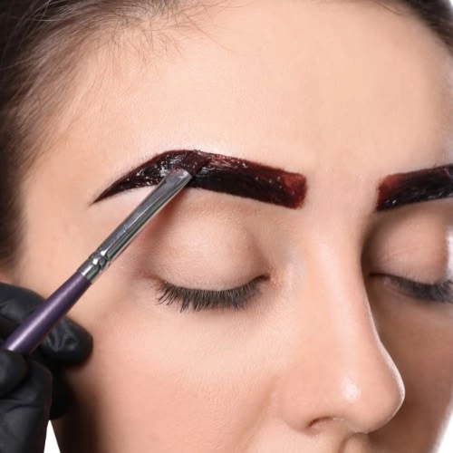 Professional brow lamination session for lifted brows